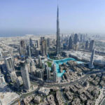 An aerial view of the burj khalifa in dubai. by Chasing the Sun Vacations