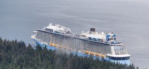 A large cruise ship in the middle of a body of water. by Chasing the Sun Vacations